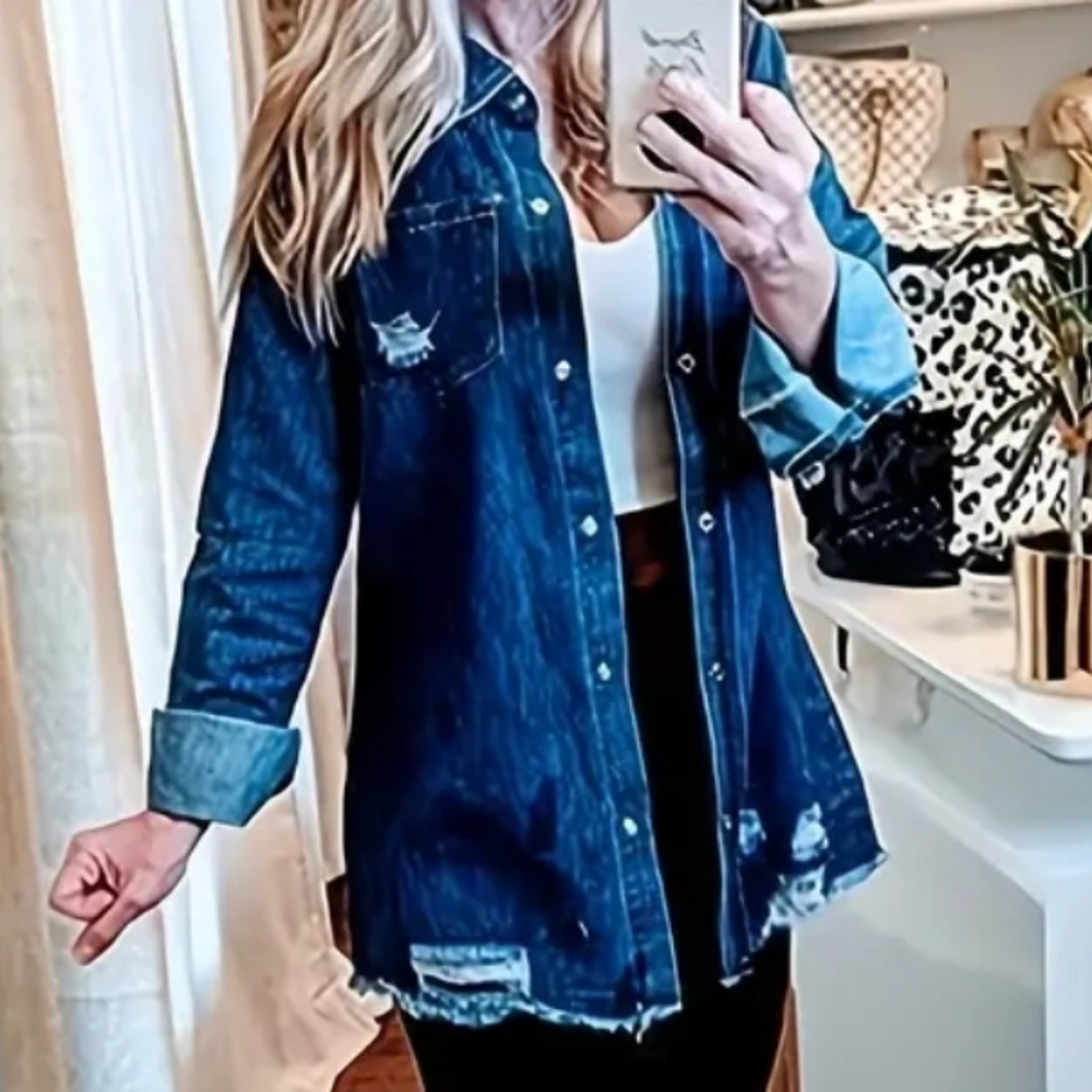 Women's distressed denim button down top. Raw Hems, heavy material.